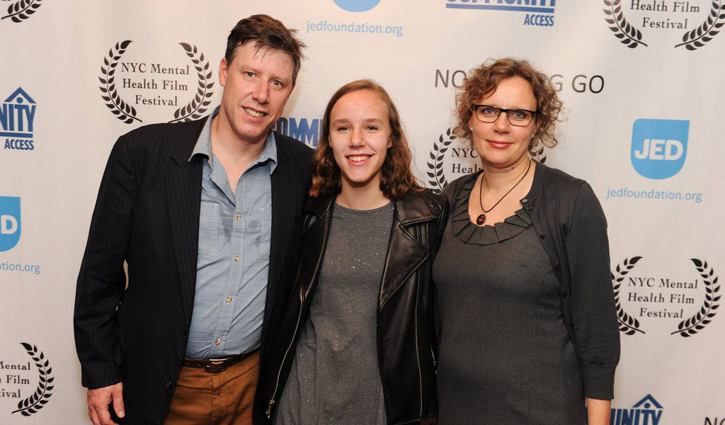 Francesca Murdoch with her parents at awards ceremony